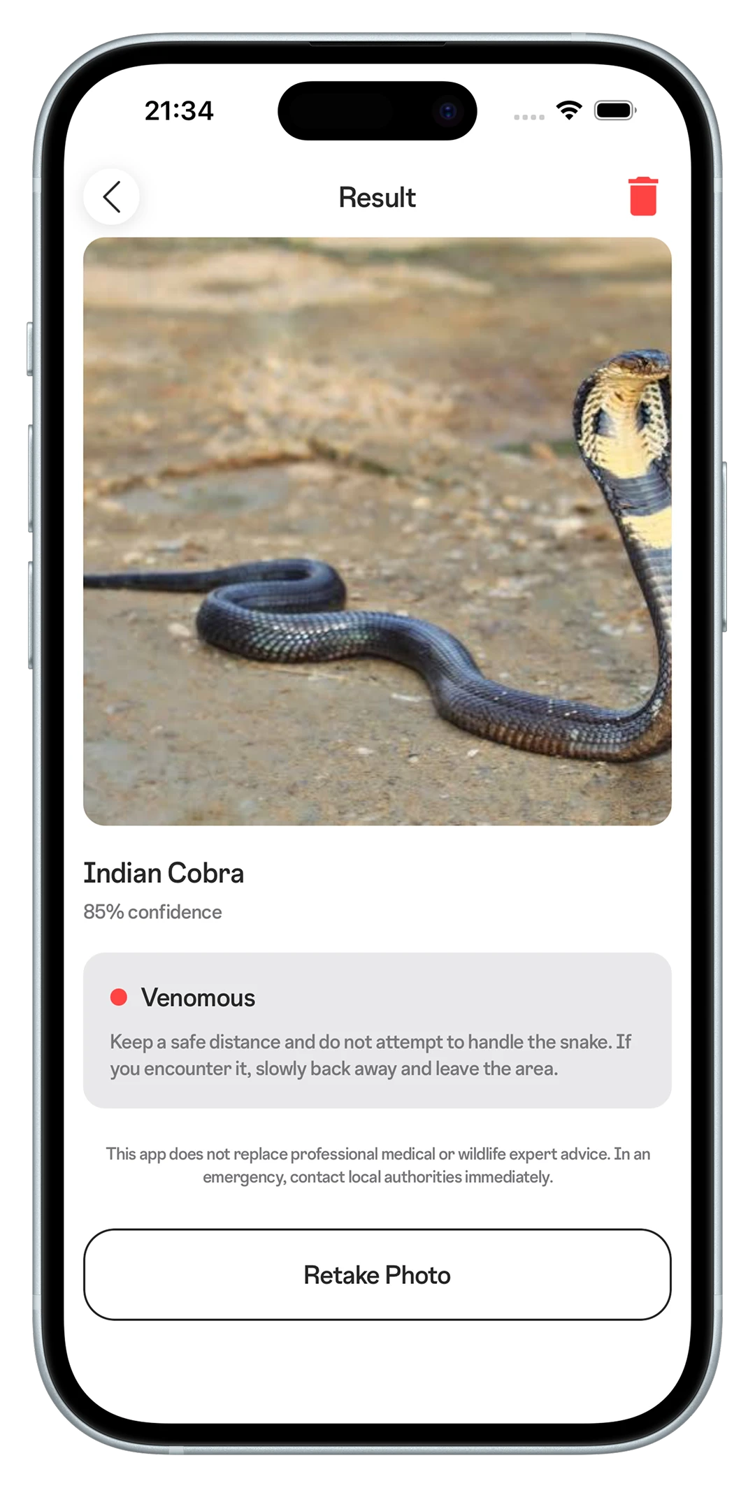 Snake ID Ergebnisbildschirm mit einer als giftig identifizierten Indischen Kobra und Sicherheitshinweis
